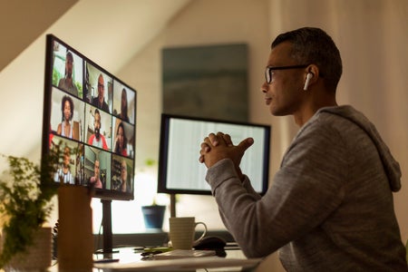 Businessman on video call from home office