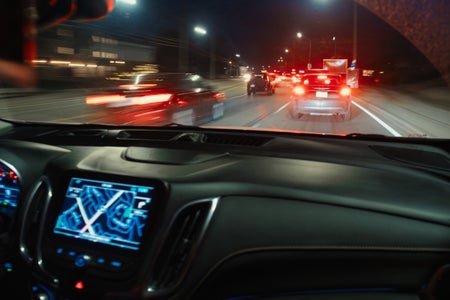 GPS map mounted on dashboard of car