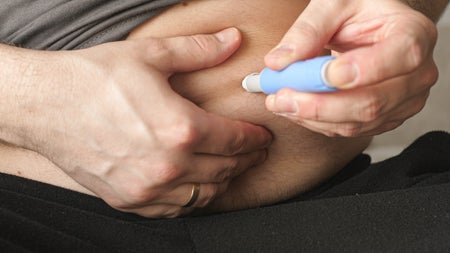 Man preparing Semaglutide Ozempic injection