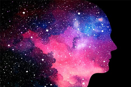 Profile of head on starry space background